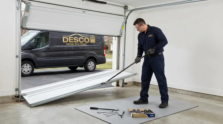 Off Track Repair by Desco Garage Door Repair - Professional technician performing off track service